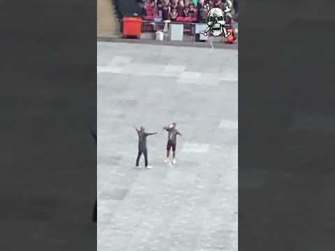 Mates play air guitar to Def Leppard at half-empty Wembley Stadium
