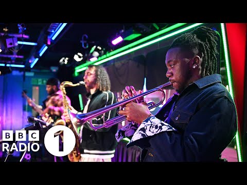 Ezra Collective – God Gave Me Feet For Dancing ft. (ft. Yazmin Lacey) (Live Lounge)