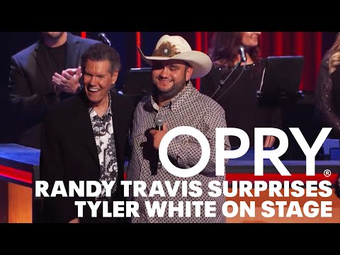 Randy Travis Surprises Tyler White from ‘Love On The Spectrum’ on Stage at the Grand Ole Opry