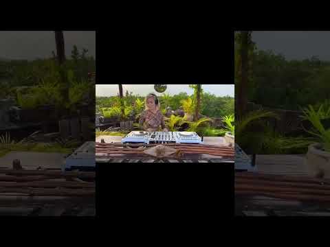 Tropical Grooves  DJ Dances While She Mixes