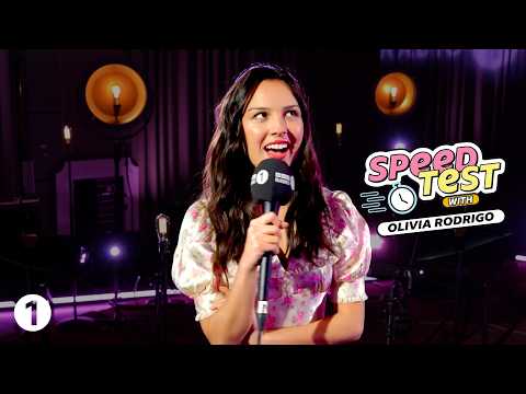 Olivia Rodrigo plays Speed Test: Can she guess songs by Sombr, KATSEYE + more?